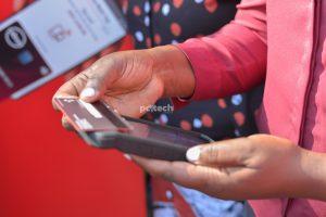 A merchant demonstrates using the Absa Mobi Tap device. PHOTO: PC Tech Magazine