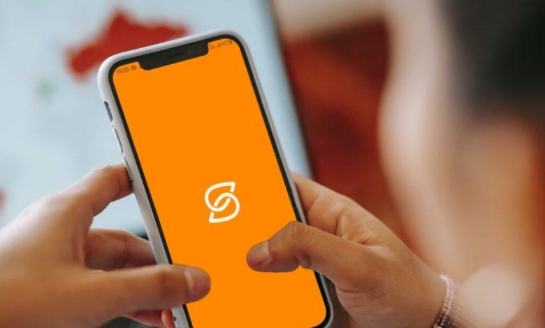 Pictured shows a silhouette of a person opening the safeboda app. FILE PHOTO/COURTESY PHOTO