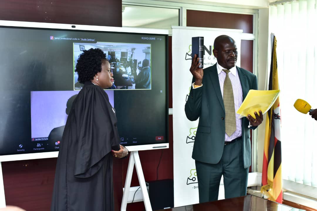 Julius Otai takes oath as a new Board member of NITA-U.