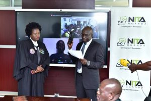 Michael Ocero takes oath as a new Board member of NITA-U.