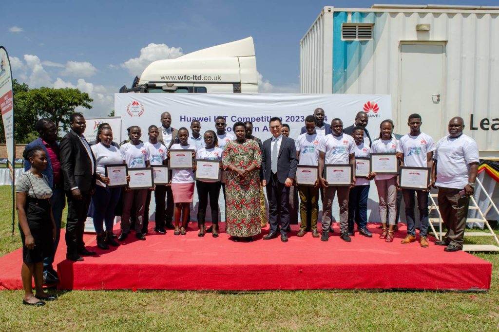 H.E. Jessica Alupo, the Vice President of Uganda (center) and Gao Jian, the Deputy Managing Director of Huawei Uganda (center with VP) pose for a group photo with students that emerged 2nd at the global Huawei ICT Competitions 2022/23 in Shenzhen, China.