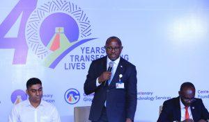 Fabian Kasi; Managing Director at Centenary Bank addressing the press during the launch of CenteWhatsApp Banking Service at Mapeera House.