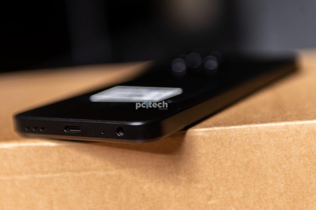 Mione Joy 9 bottom panel has the USB Type-C port, 3.5mm earphone port, a single mono speaker grille, and a microphone. PHOTO: PC Tech Magazine / Olupot Nathan Ernest