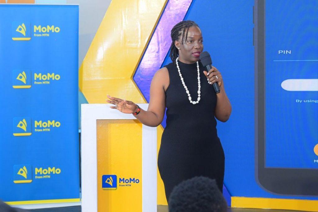 Viola Namuyaba, the Senior Manager of Payments and e-Commerce at MTN Mobile Money (U) Limited briefing the press during the launch of their new ticketing option added to their MTN MoMo platform. COURTESY PHOTO / MTN Uganda