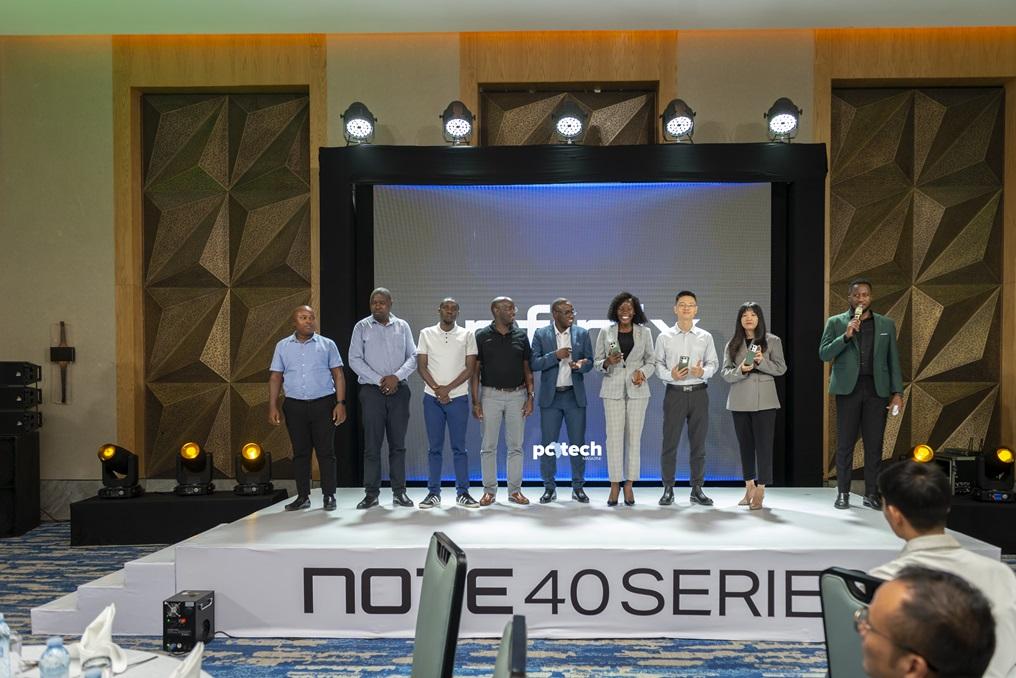 State Minister of Finance for Investment and Privatization, Hon. Anite Evelyn (4th from right) poses with the Infinix teams and its partners at the launch of the Infinix NOTE 40 series at Four Points by Sheraton. PHOTO: PC Tech Magazine