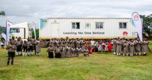 Pupils of Kakumiro Public School making a presentation on digital transformation at the launch of the Huawei DigiTruck Project in Kakumiro on Sunday, April 28, 2024 at the Kakmuiro District headquarters. COURTESY PHOTO