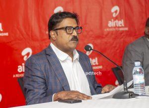 Manoj Murali, Managing Director of Airtel Uganda addressing the press during the handover of a cheque of UGX34.8bn to UCC from Airtel Uganda to support the country's development of rural communications infrastructure. PHOTO: Olupot Nathan Ernest / PC Tech Magazine