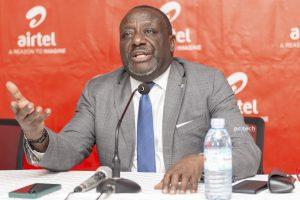 Hon. Nyombi Thembo, UCC Executive Director addressing the press during the handover of a cheque of UGX34.8bn to UCC from Airtel Uganda to support the country's development of rural communications infrastructure. PHOTO: Olupot Nathan Ernest / PC Tech Magazine