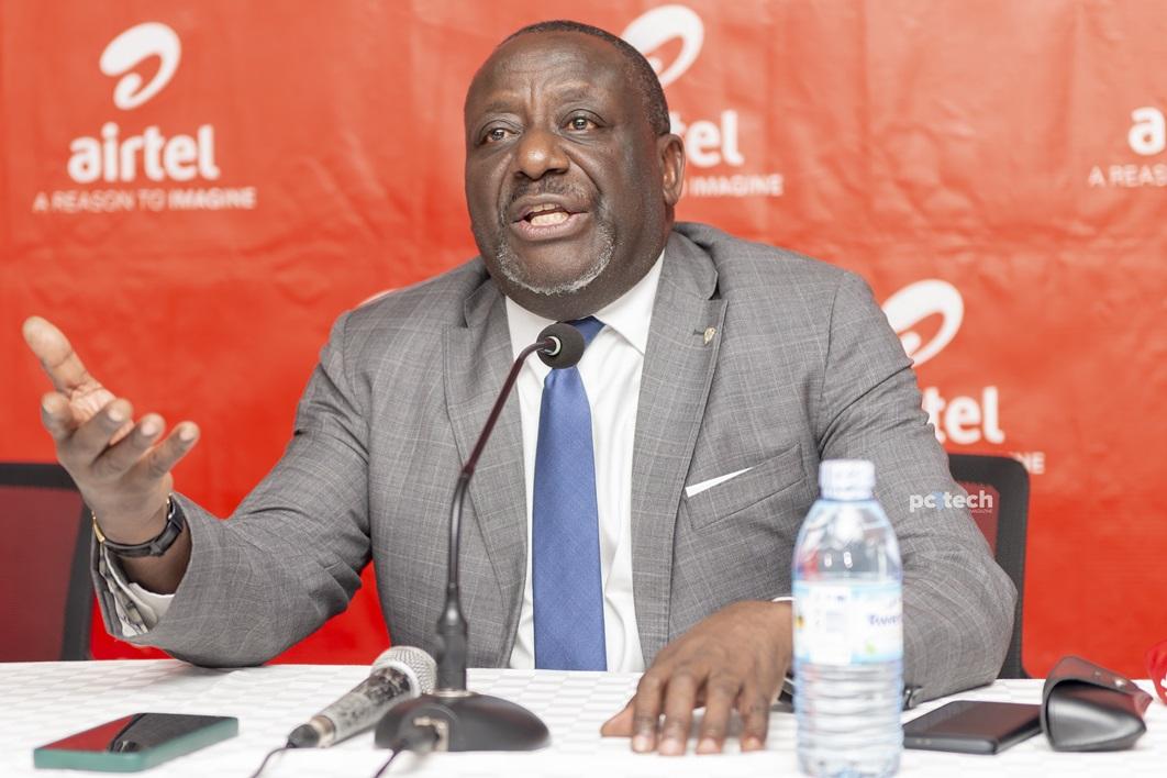 Hon. Nyombi Thembo, UCC Executive Director addressing the press during the handover of a cheque of UGX34.8bn to UCC from Airtel Uganda to support the country's development of rural communications infrastructure. PHOTO: Olupot Nathan Ernest / PC Tech Magazine