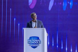 Sam Mwogeza, the Stanbic Bank Executive Director speaking to attendees at the 9th edition of the Stanbic National Schools’ Championship finals. COURTESY PHOTO