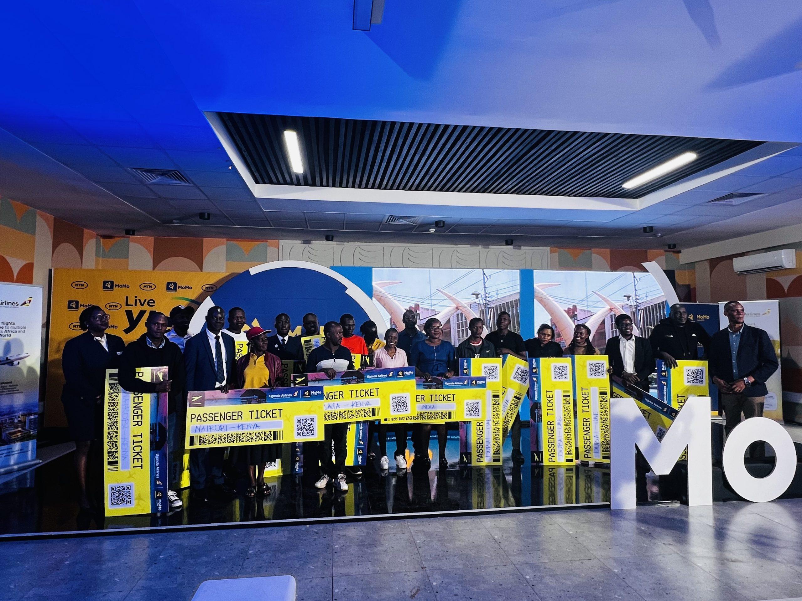 MTN MoMo Uganda Gives away over 100 Air tickets to its International