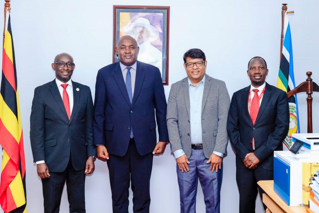 L to R: David Birungi; Airtel Uganda's Public Relations Manager, Honourable Minister of ICT and National Guidance, Dr. Chris Baryomunsi, Soumendra Sahu; Managing Director of Airtel Uganda, and . Godfrey Bakibinga; Director Legal and Regulatory Affairs at Airtel Uganda pose for a group photo. COURTESY PHOTO