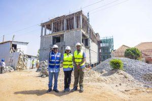 L-R: Centenary Group Chairman, Prof. John Ddumba-Ssentamu, Centenary Group’s Group Company Secretary & General Counsel; Brenda Magoba, and Centenary Technology Services’ Chief Technology Officer; Peter Kahiigi pose for a group photo at the construction site of Centenary Group’s state-of-the-art Tier 3 Green Data Centre. PHOTO: Kulu Erick