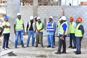 Executives from Centenary Group and Centenary Technology Services assessing the construction progress of their state-of-the-art Tier 3 Green Data Centre in Masaka. PHOTO: Kulu Erick
