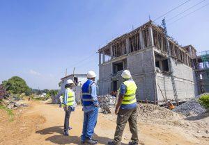 L-R: Centenary Group’s Group Company Secretary & General Counsel; Brenda Magoba, Centenary Group Chairperson; Prof. John Ddumba-Ssentamu, and Centenary Technology Services’s Chief Technology Officer; Peter Kahiigi view one of the constructed blocks of Centenary Group’s state-of-the-art Tier 3 Green Data Centre. PHOTO: Kulu Erick