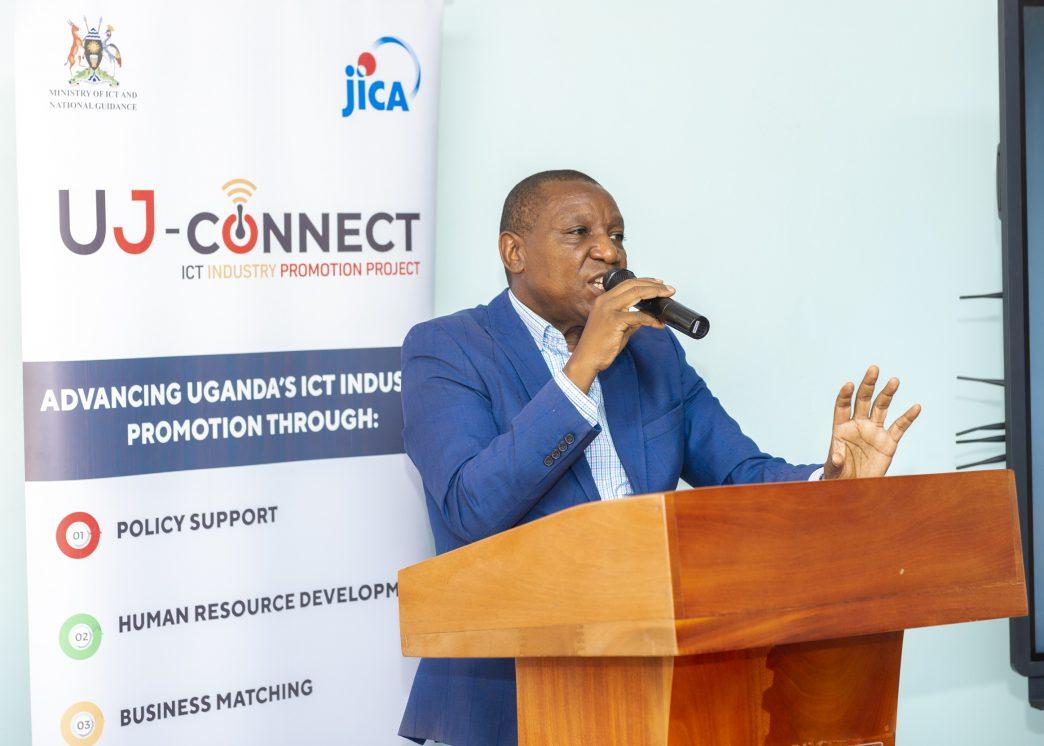 Moses Watasa, the Commissioner for Information and Communication at the Ministry of ICT and National Guidance speaking at the launch of the Uganda ICT Intellectual Property (IP) Guidelines at the National ICT Innovation Hub on Friday, February 14th, 2025. PHOTO: PC Tech Magazine