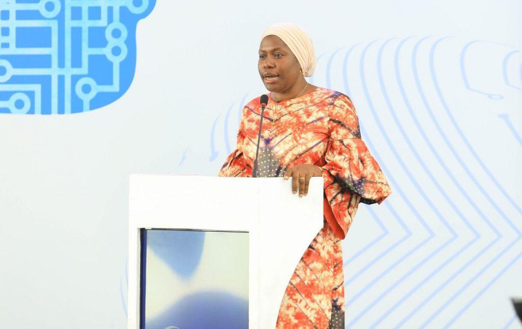 Dr. Aminah Zawedde, Permanent Secretary of the Ministry of ICT and National Guidance speaking to secondary school girls, in commemoration of International Girls in ICT Day at the National ICT Innovation Hub on Thursday, April 24, 2025. PHOTO: UCC