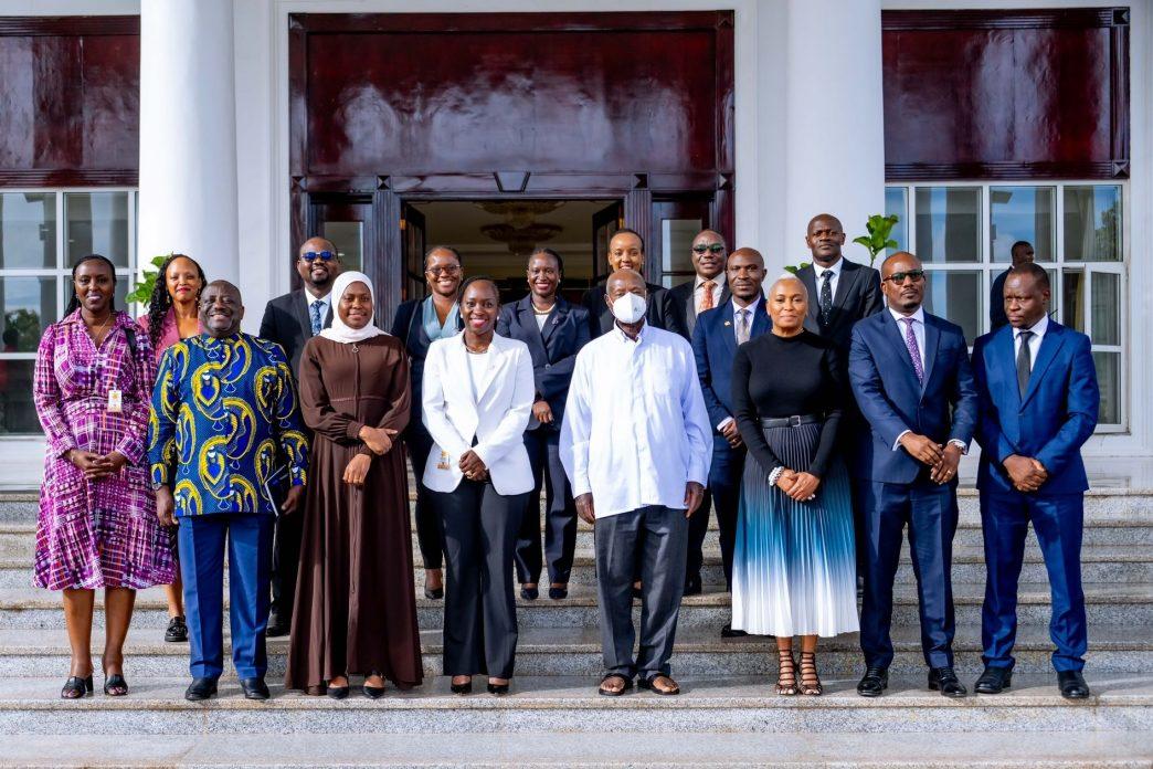 President Yoweri Kaguta Museveni (in mask) in a group photo with ATC Uganda representatives led by their CEO Dorothy Kabagambe Ssemanda (3rd from right), reprenstatives from the Ministry of ICT and UCC led by Nyombi Thembo (front line,left) and Aminah Zawedde (front line, 2nd from left) respectively after a high-level meeting at State House Entebbe. COURTESY PHOTO