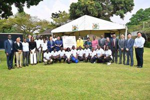 First Lady and Minister of Education and Sports, Hon. Janet Museveni (in yellow coat) poses for a group photo with Huawei Technologies officials, and other guests including student participants from Huawei competitions after launching nationwide 2025-2026 Huawei ICT Competition. COURTESY PHOTO