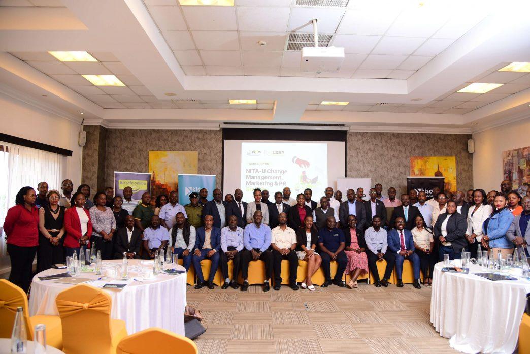Delegates from MDAs pose for a group photo after a a high-level validation workshop organized by NITA-U. COURTESY PHOTO