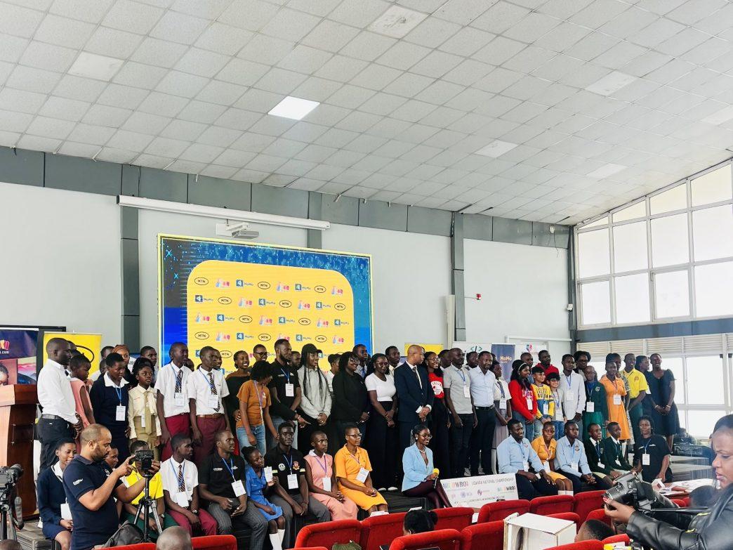 School reprenstatives, judges, and partners pose for a group photo at the World Robot Olympiad Uganda National Championship held at the National ICT Innovation Hub. COURTESY PHOTO