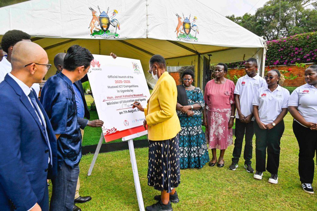 First Lady and Minister of Education and Sports, Hon. Janet Museveni, signing a pluck card after launching nationwide 2025-2026 Huawei ICT Competition. COURTESY PHOTO