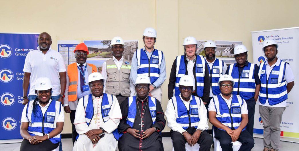 Centenary Group pose for a group photo (Anti-clockwise) Brenda Magoba, Bishop Serverus Jjumba, Bishop Francis Kibira, Prof. John Ddumba Ssentamu, Dr. Grace Ssekakubo, Peter Kahiigi, Kimanthi Mutua, Dennis Byabagye, Michel Jean Dubois, Frank Streppel, Wilson Mpumwire (Contractor), Deo Mutebi, and Steven Kirenga. COURTESY PHOTO