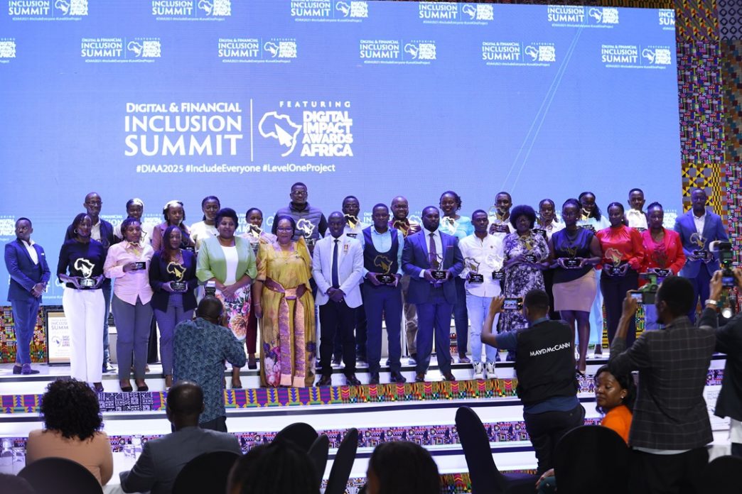 Hon. Joyce Nabosa Sebugwawo (in a gomesi), the State Minister for ICT, pose for a group photo with all the winners of the 2025 Digital Impact Awards Africa. COURTESY PHOTO