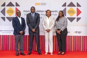 (L-R): Awel Uwihanganye, Dr. Michael Atingi-Ego, Ms. Sylvia Mulinge, and Edline Murungi pose for a group photo at the 2025 Kampala Blockchain Summit at Four Points by Sheraton. COURTESY PHOTO