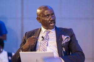 Dr. Tumubweine Twinemanzi, Executive Director of the Bank Supervision Directorate of the Bank of Uganda, speaking at the 2025 Kampala Blockchain Summit at Four Points by Sheraton. COURTESY PHOTO