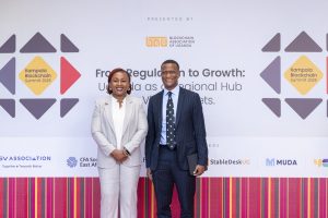 Reginald Tumusiime (L) and Sylvia Mulinge (R) at the 2025 Kampala Blockchain Summit at Four Points by Sheraton. COURTESY PHOTO