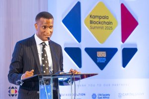 Reginald Tumusiime, President of the Blockchain Association of Uganda, speaking at the 2025 Kampala Blockchain Summit at Four Points by Sheraton. COURTESY PHOTO