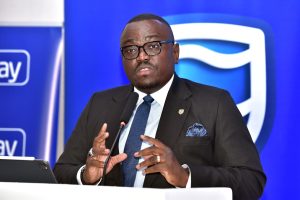 Tunde Thorpe, Executive Head of Business & Commercial Banking at Stanbic Bank Uganda, speaking during the announcement of the bank's partnership with FinCom Technologies to deliver the first fully digital lending solution for schools in the country. COURTESY PHOTO