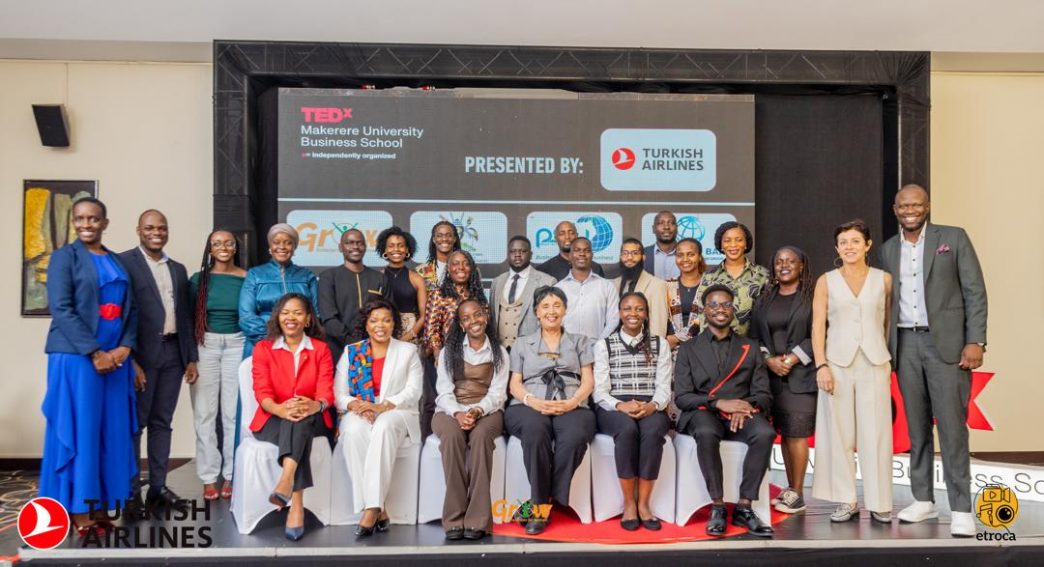 Key note speakers and sponsors of the TEDx Makerere Business School pose for a group photo at the end of the TEDx event. COURTESY PHOTO