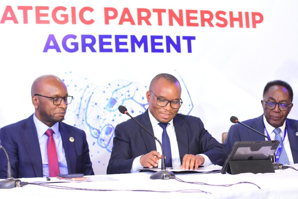 (L-R.) Peter Kahiigi, Chief Technology Officer of CENTE Tech, Grace Ssekakubo, CEO of CENTE Tech and Prof John Ddumba Ssentamu, the Board Chairman of Centenary Group signing an MoU with Service Cops, formalizing a strategic technology and business partnership to accelerate digital transformation in Uganda. COURTESY PHOTO