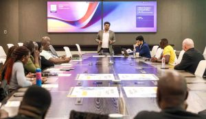 MTN South Africa’s General Manager for Enterprise Solutions, Sudipto Moitra, addresssing the Ugandan delegation following the successful arrival of Uganda's made Kayoola Electric Bus in Cape Town, South Africa. COURTESY PHOTO