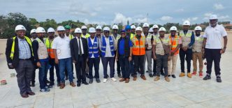 Officials from Centenary Group, Centenary Technology Services, and other partners and contractors pose for a group photo after touring the yet to be launched Centenary Group's Data Centre in Masaka. COURTESY PHOTO