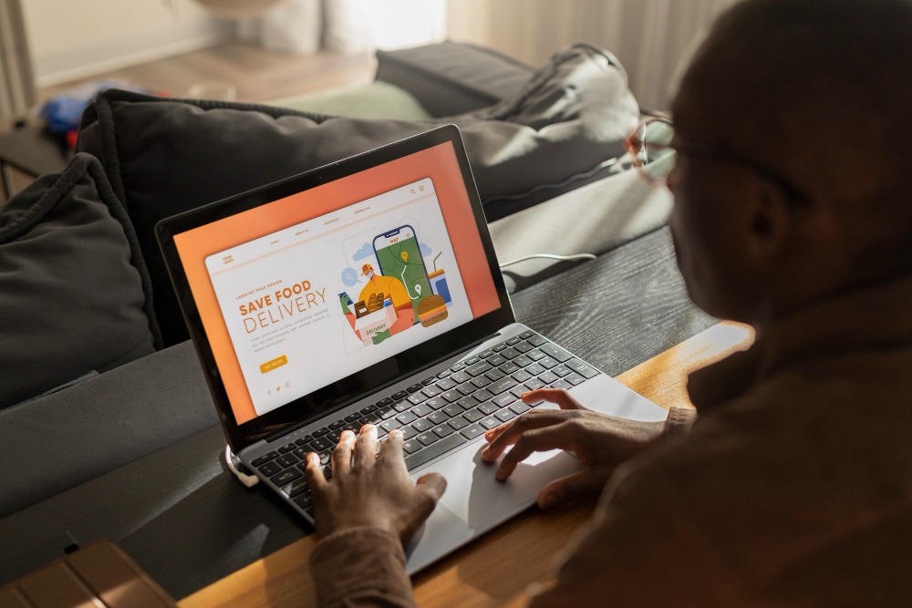 Man ordering groceries online. PHOTO: Freepik