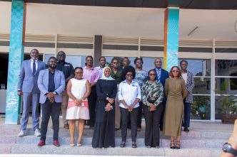 Dr. Aminah Zawedde and Dr. Monica Musenero pose for a group photo with other officials at the National ICT Innovation Hub, Nakawa. COURTESY PHOTO