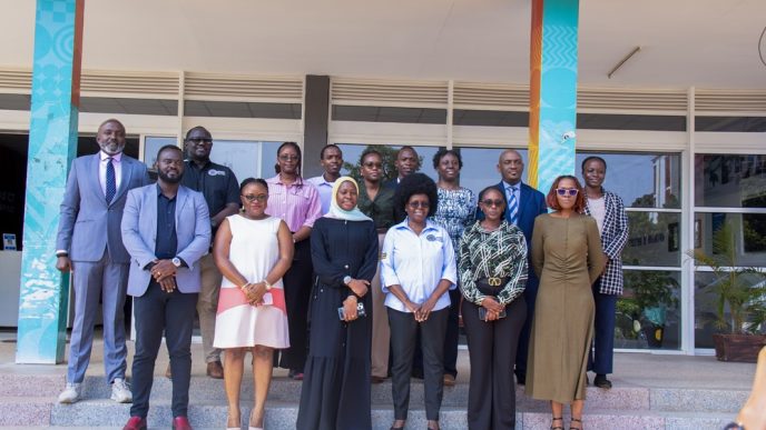 Dr. Aminah Zawedde and Dr. Monica Musenero pose for a group photo with other officials at the National ICT Innovation Hub, Nakawa. COURTESY PHOTO