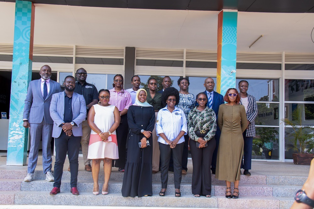 Dr. Aminah Zawedde and Dr. Monica Musenero pose for a group photo with other officials at the National ICT Innovation Hub, Nakawa. COURTESY PHOTO