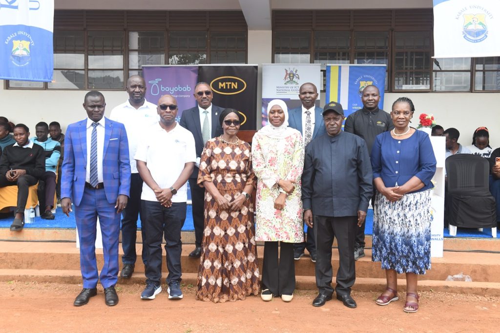 Dr. Amina Zawedde (3rd from right), Prof. William Bazeeyo, Joy Kwesiga, Peter Kahiigi, and other representatives from the Ministry of ICT, Kabale University, and MTN Foundation, pose for a group photo after handing over the Kabale MTN Spark Hub to Kabale University.
