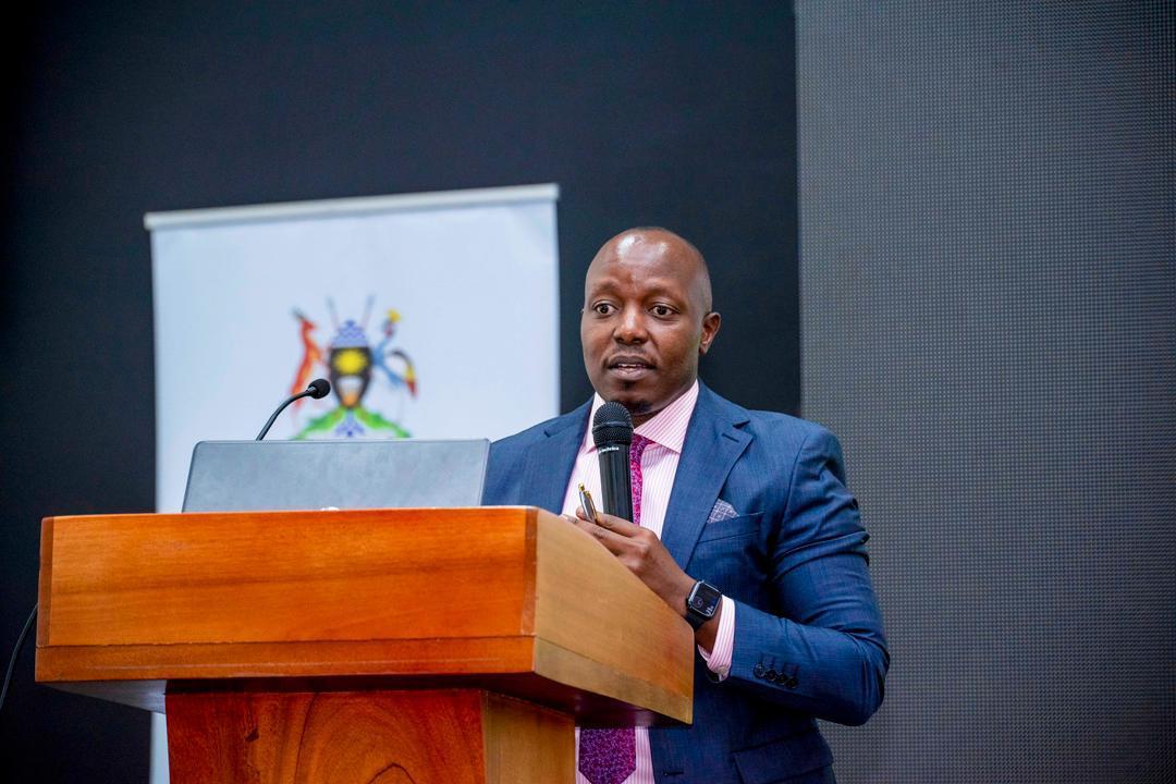 Edmond Machelli Project Coordinator, UDAP-GovNet at NITA-Uganda, speaking at a high-level stakeholder engagement to shape accessible digital future for Persons with Disabilities (PwDs). COURTESY PHOTO