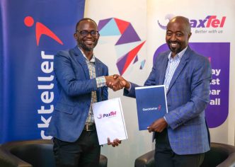 Interswitch (L) Yusuf Lule, Country Head, Finance and Supply Chain, and (R) Hamilton Telecom CEO - Otaremwa Otuhumurize.
