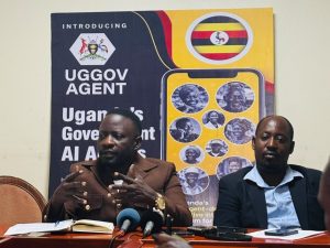 Dr. Hillary Musoke (left) and Ronald Katamba (right), briefing the journalists at the launch of the UGGov Agent by AfroSoft IT Solutions, at Hotel Africana. PHOTO: @IanJeremiah_/via X