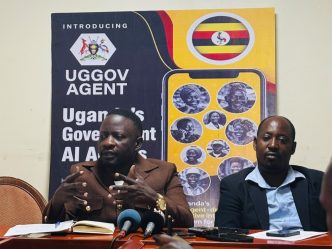 Dr. Hillary Musoke (left) and Ronald Katamba (right), briefing the journalists at the launch of the UGGov Agent by AfroSoft IT Solutions, at Hotel Africana. PHOTO: @IanJeremiah_/via X