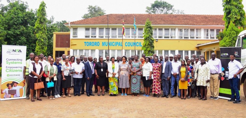 Officials from the Ministry of ICT and National Guidance, National Information Technology Authority-Uganda (NITA-U), Posta Uganda, Ministry of Public Service, and Tororo local leadership pose for a group photo after a joint site inspection of the Tororo Service Uganda Centre. COURTESY PHOTO