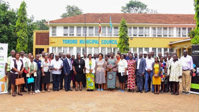 Officials from the Ministry of ICT and National Guidance, National Information Technology Authority-Uganda (NITA-U), Posta Uganda, Ministry of Public Service, and Tororo local leadership pose for a group photo after a joint site inspection of the Tororo Service Uganda Centre. COURTESY PHOTO