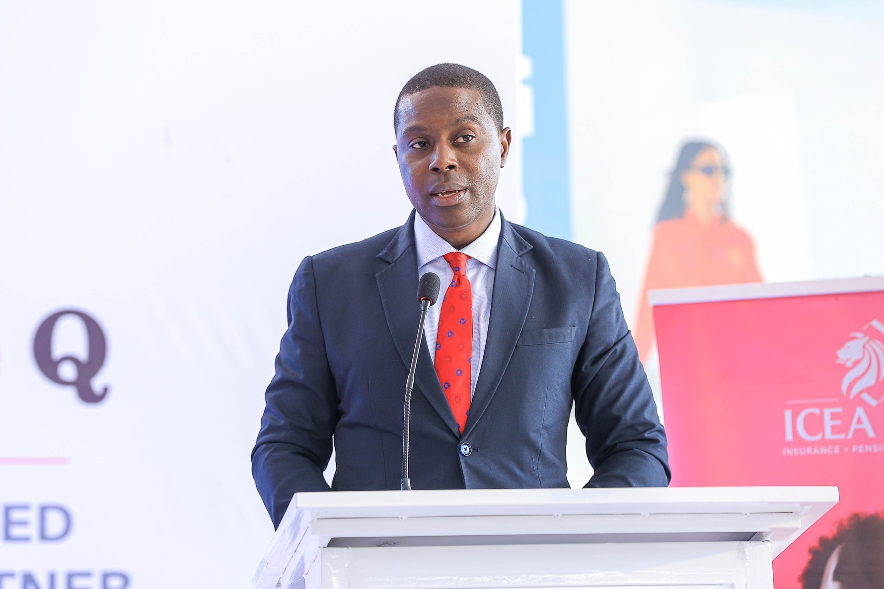 Ambrose Kibuuka, Chief Executive Officer of ICEA LION General Insurance, speaking during a partnership announcement with DFCU Bank and Double Q to make new commercial vehicles more accessible. COURTESY PHOTO