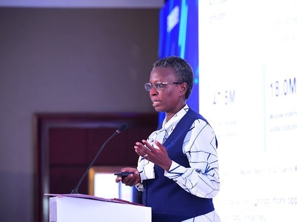 Eng. Christine Mugimba, Director of ICT and Research at UCC, speaking at the inaugural National Cybersecurity Conference at the Kampala Sheraton Hotel. COURTESY PHOTO